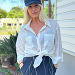 White Cotton  long sleeved Shirt with front pockets.