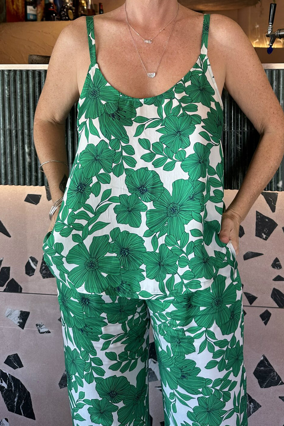 Floral cami in cupro fabric. Open at back with adjustable straps.