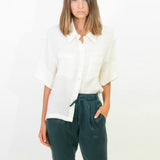 Silk button down shirt.