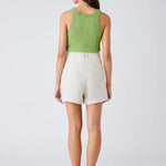 Esmaee Avalon high waisted linen shorts in beige.
