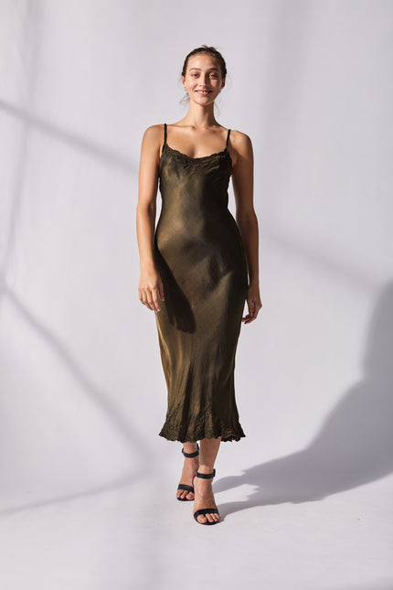 Olive green silk bias dress.