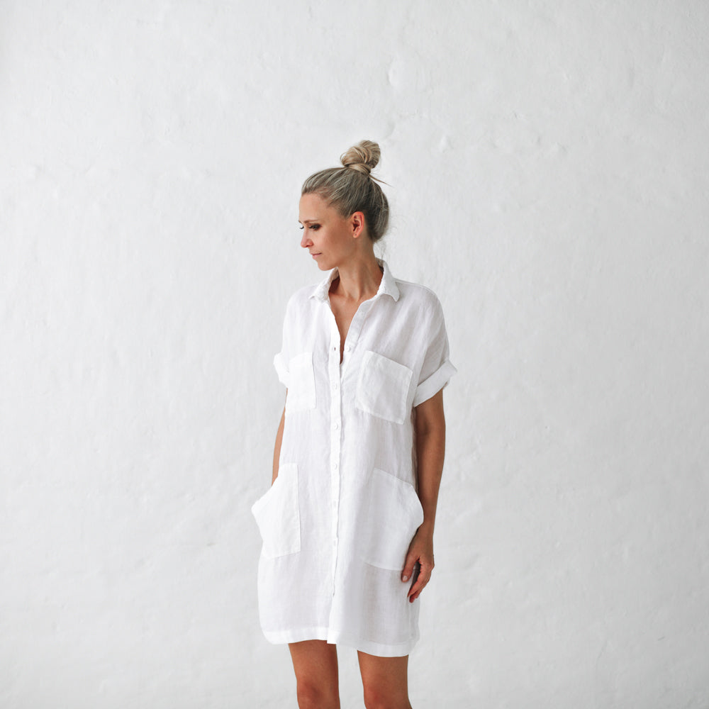White linen tunic with pockets.